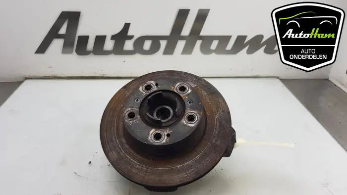 Wielnaaf achter Porsche Boxster