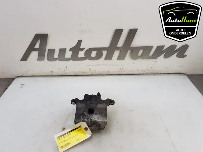 Remklauw (Tang) links-voor Nissan Pulsar