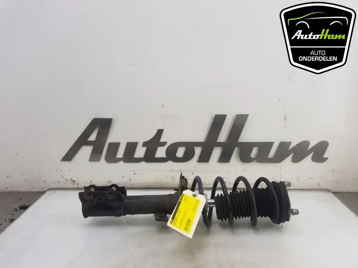 Schokdemper links-voor Ford Transit Courier