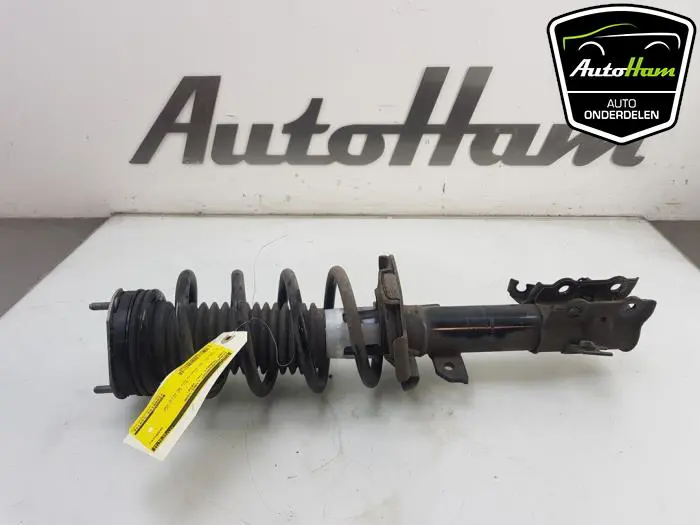 Schokdemper links-voor Ford Transit Courier