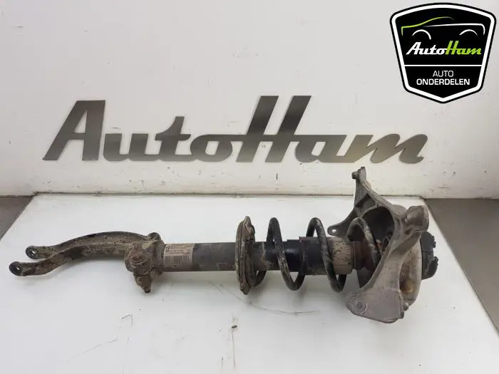 Schokdemper links-voor Audi A4