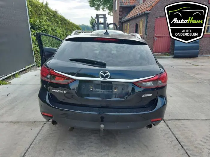 Uitlaat Einddemper Mazda 6.