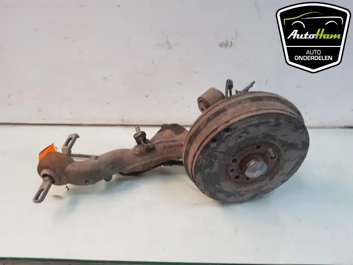 Fusee links-achter Opel Combo