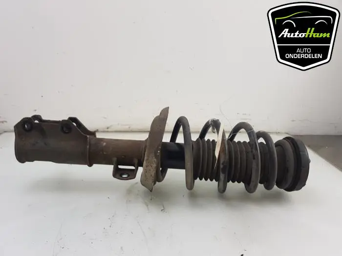Schokdemper links-voor Opel Zafira C