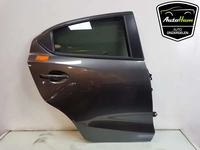 Portier 4Deurs rechts-achter Mazda 2.