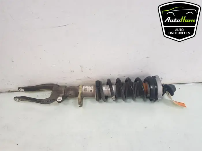Schokdemper links-voor BMW M5
