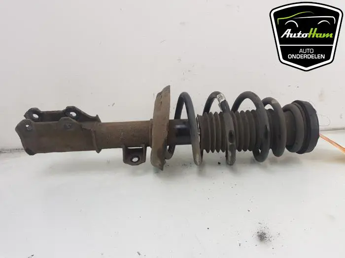 Schokdemper links-voor Opel Zafira C