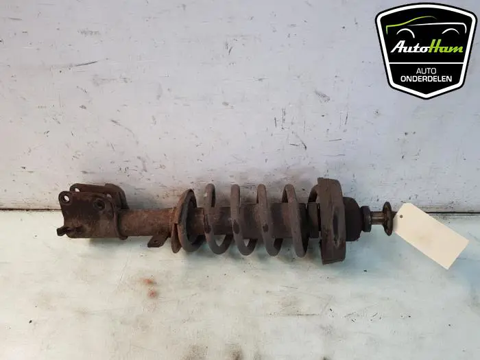 Schokdemper links-voor Renault Trafic