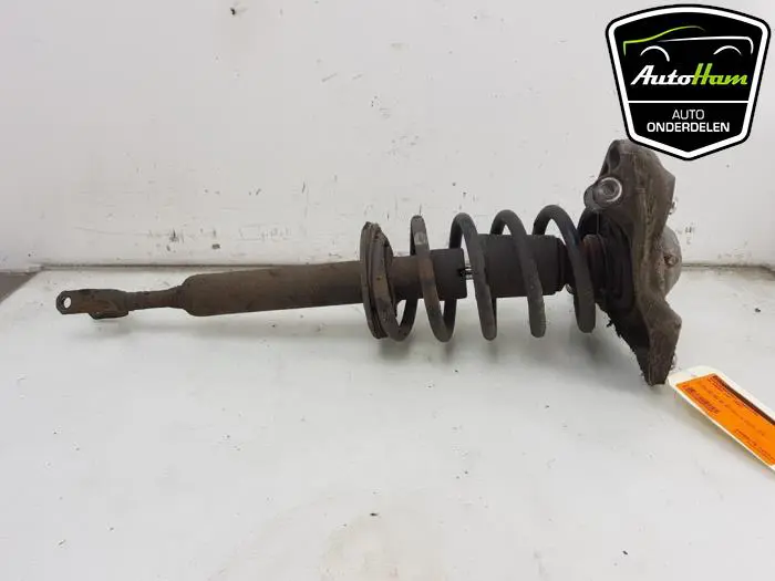 Schokdemper links-voor Volkswagen Passat