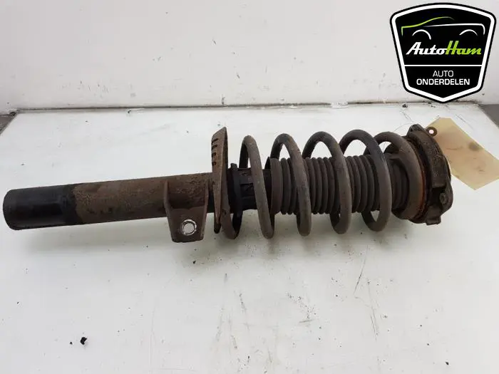 Schokdemper links-voor Volkswagen Caddy