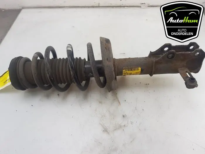 Schokdemper links-voor Opel Zafira C