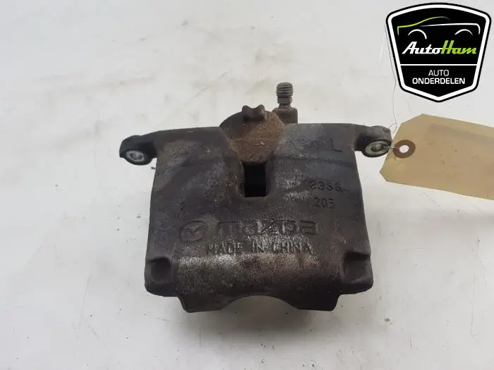 Remklauw (Tang) links-voor Mazda CX-3