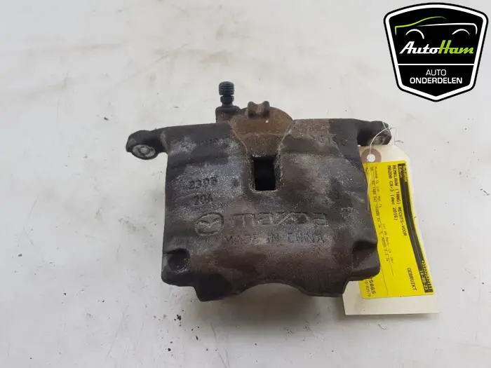 Remklauw (Tang) rechts-voor Mazda CX-3