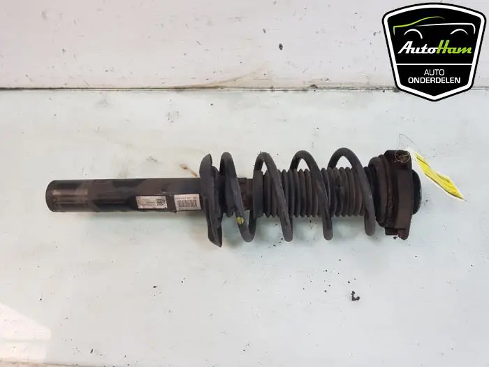 Schokdemper links-voor Volkswagen Caddy