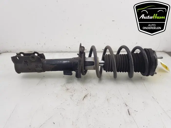 Schokdemper links-voor Ford Transit Courier