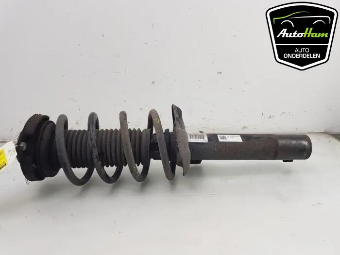Schokdemper links-voor Volkswagen Caddy