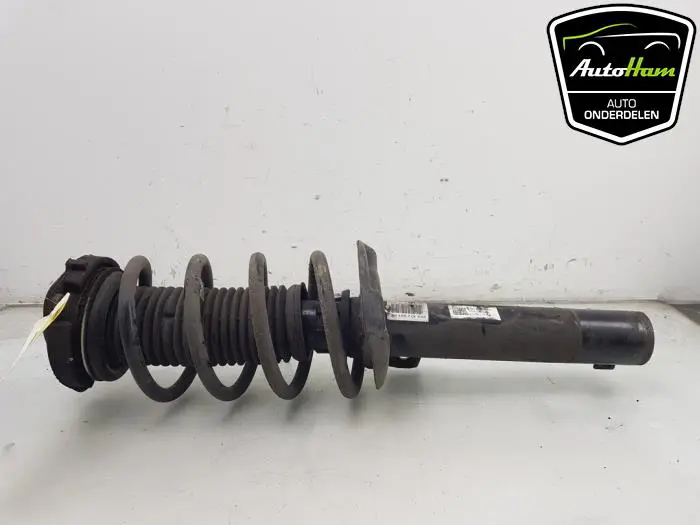 Schokdemper rechts-voor Volkswagen Caddy