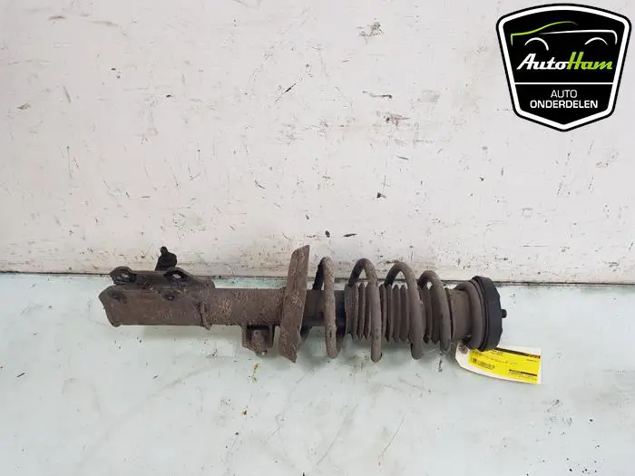 Schokdemper links-voor Opel Zafira
