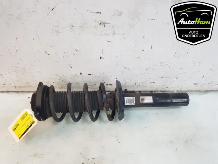 Schokdemper links-voor Volkswagen Caddy