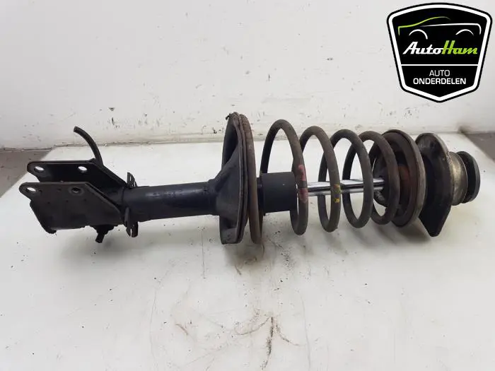 Schokdemper links-voor Fiat Doblo