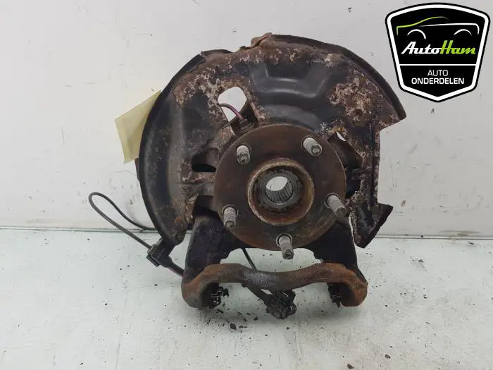 Fusee links-voor Mazda 3.