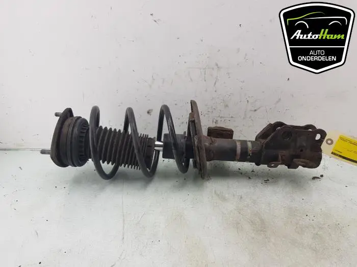 Schokdemper links-voor Mazda 3.