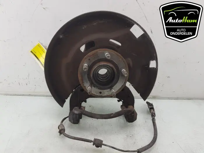 Fusee links-voor Opel Zafira C