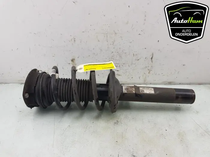 Schokdemper links-voor Volkswagen Caddy