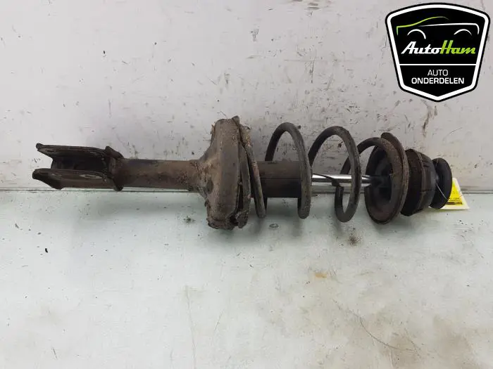 Schokdemper links-voor Renault Kangoo