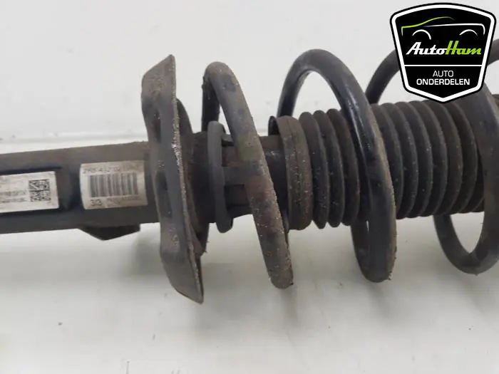 Schokdemper links-voor Volkswagen Caddy