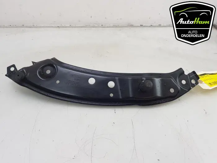 Koplampframe links Volkswagen Caddy
