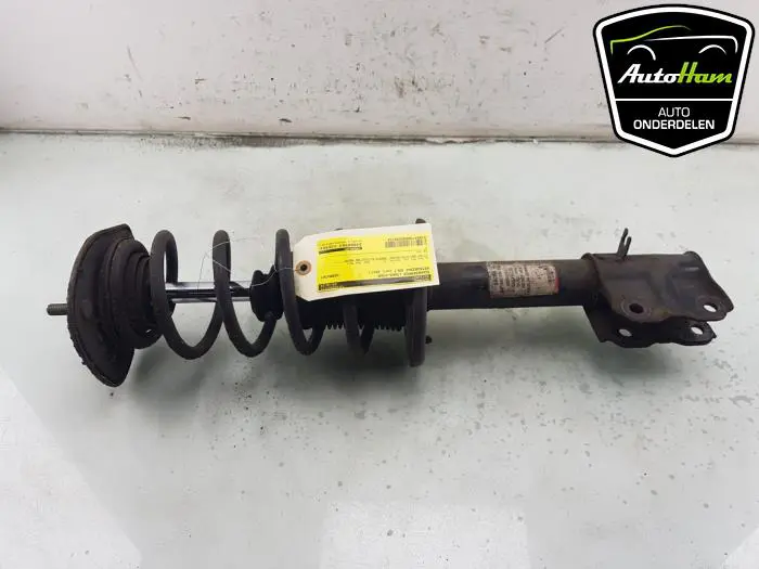 Schokdemper links-voor Mitsubishi Colt