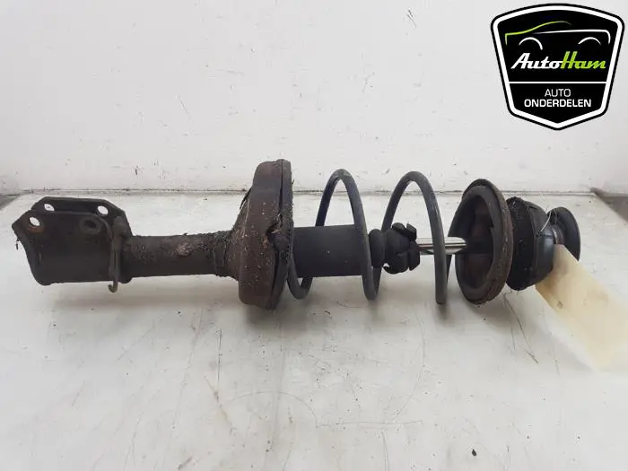 Schokdemper links-voor Renault Clio