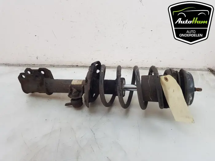 Schokdemper links-voor Opel Combo