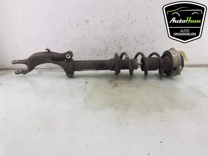 Schokdemper links-voor Audi A4