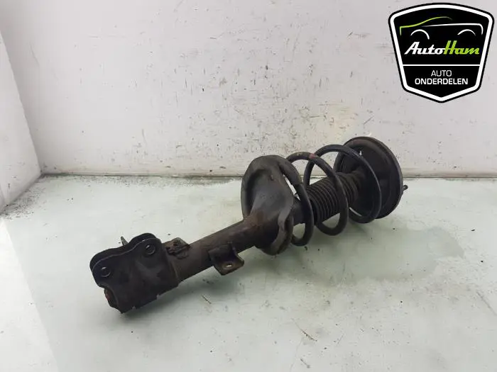 Schokdemper links-voor Mitsubishi Outlander