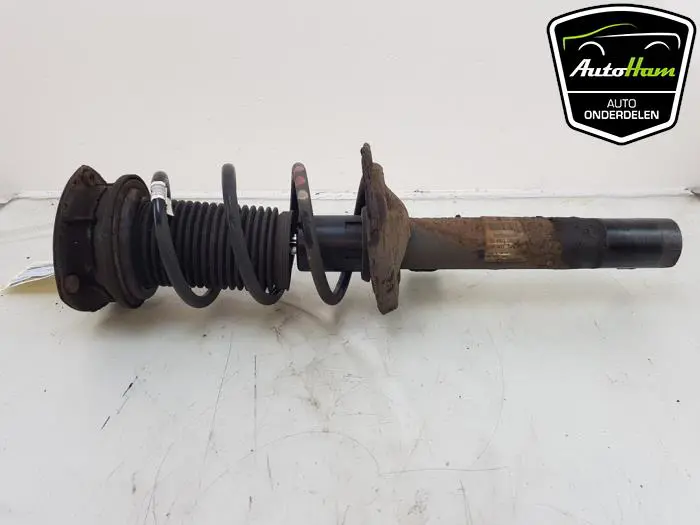 Schokdemper links-voor Audi A3