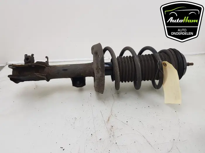Schokdemper links-voor Opel Corsa
