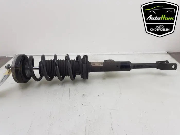 Schokdemper links-voor BMW 5-Serie