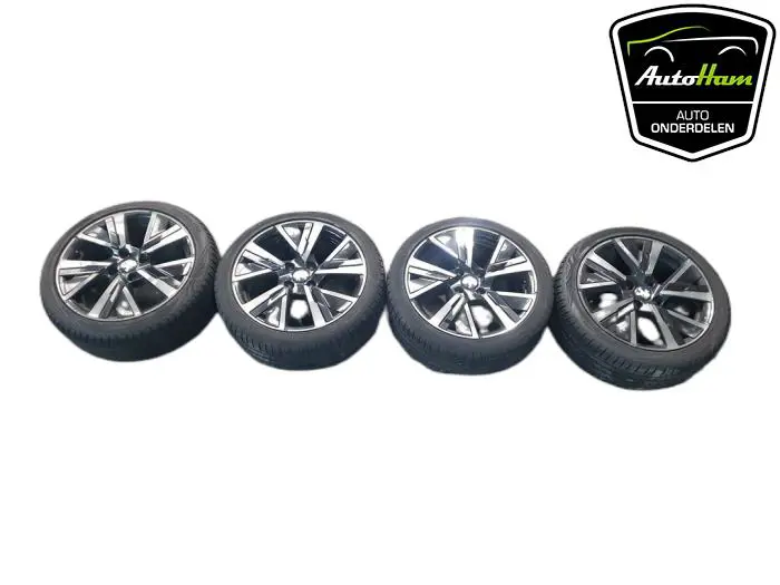 Sportvelgenset + banden Peugeot 208