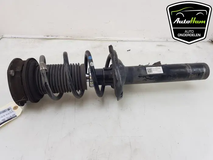 Schokdemper links-voor Audi A3