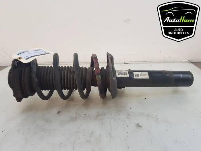 Schokdemper links-voor Volkswagen Caddy