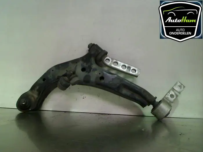 Draagarm links-voor Nissan Almera Tino