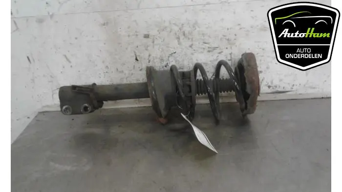 Schokdemper links-voor Renault Scenic